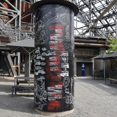 Frot de Fret an der Litfaßsäule auf dem Gelände der Völklinger Hütte